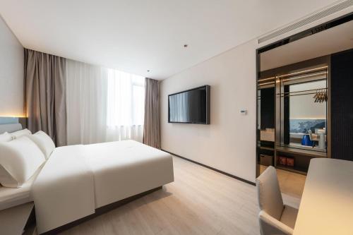 Imagen de la habitación del Hotel Atour Light Jinan Harmony Square Provincial Hospital. Foto 13