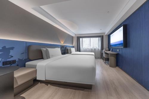 Imagen de la habitación del Hotel Atour Light Kunming Dongfeng Plaza Beijing Road. Foto 12