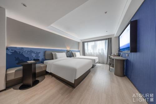 Imagen de la habitación del Hotel Atour Light Kunming Dongfeng Plaza Beijing Road. Foto 13