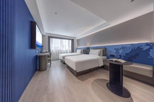 Imagen de la habitación del Hotel Atour Light Kunming Dongfeng Plaza Beijing Road. Foto 15