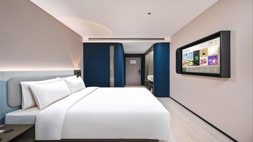 Imagen de la habitación del Hotel Atour Light Kunming Huanhu Road Dianchi Convention and Exhibition Center. Foto 8