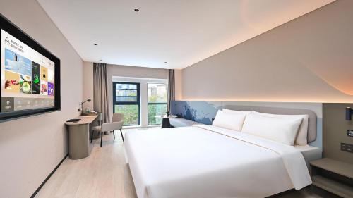 Imagen de la habitación del Hotel Atour Light Kunming Huanhu Road Dianchi Convention and Exhibition Center. Foto 9