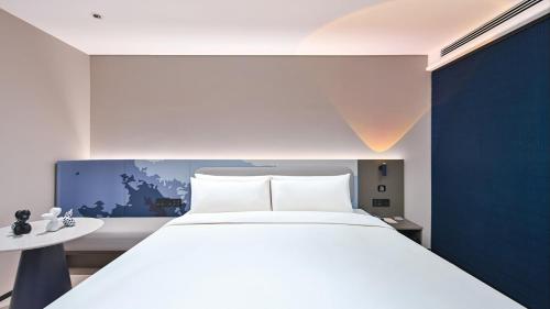 Imagen de la habitación del Hotel Atour Light Kunming Huanhu Road Dianchi Convention and Exhibition Center. Foto 10