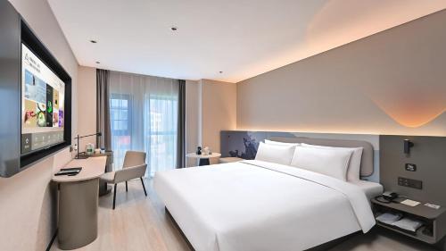 Imagen de la habitación del Hotel Atour Light Kunming Huanhu Road Dianchi Convention and Exhibition Center. Foto 11