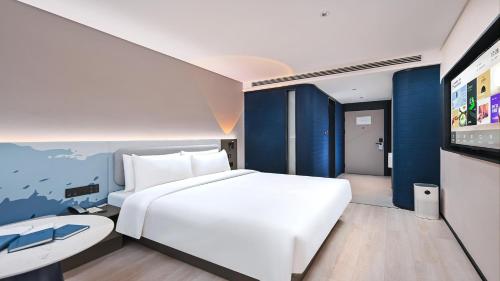 Imagen de la habitación del Hotel Atour Light Kunming Huanhu Road Dianchi Convention and Exhibition Center. Foto 12