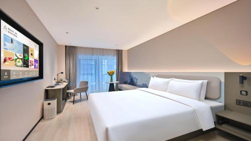 Imagen de la habitación del Hotel Atour Light Kunming Huanhu Road Dianchi Convention and Exhibition Center. Foto 13
