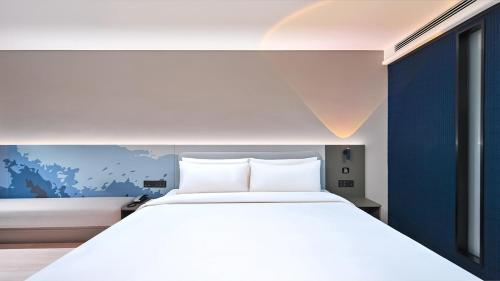 Imagen de la habitación del Hotel Atour Light Kunming Huanhu Road Dianchi Convention and Exhibition Center. Foto 14