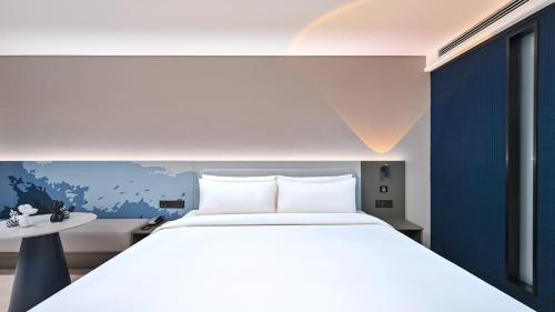 Imagen de la habitación del Hotel Atour Light Kunming Huanhu Road Dianchi Convention and Exhibition Center. Foto 15