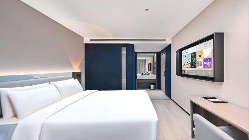 Imagen de la habitación del Hotel Atour Light Kunming Huanhu Road Dianchi Convention and Exhibition Center. Foto 16