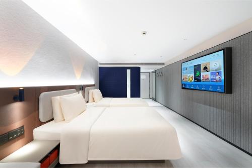 Imagen de la habitación del Hotel Atour Light Nanjing Chengxin Avenue Subway Station. Foto 6