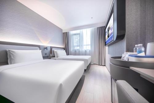 Imagen de la habitación del Hotel Atour Light Nanjing Xinjiekou Presidential Palace. Foto 4