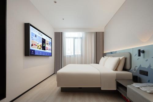 Imagen de la habitación del Hotel Atour Light Qingdao Zhanqiao Guancheng Road. Foto 3