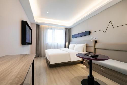 Imagen de la habitación del Hotel Atour Light Shanghai Xinzhuang Zhuanqiao Wanda. Foto 14
