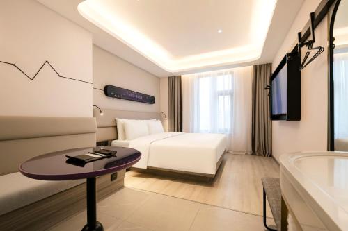 Imagen de la habitación del Hotel Atour Light Shanghai Xinzhuang Zhuanqiao Wanda. Foto 15
