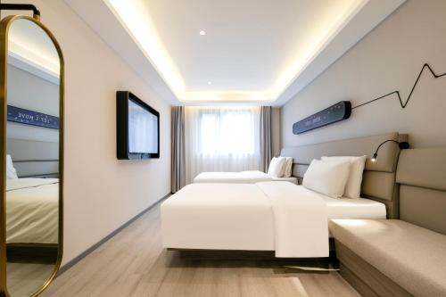 Imagen de la habitación del Hotel Atour Light Shanghai Xinzhuang Zhuanqiao Wanda. Foto 20