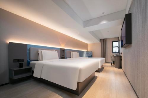 Imagen de la habitación del Hotel Atour Light Wuhan Jiangtan Jianghan Road Pedestrian Street. Foto 9