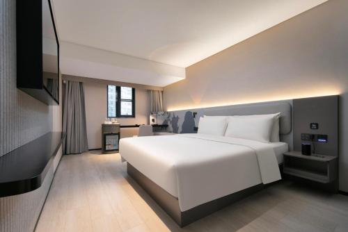 Imagen de la habitación del Hotel Atour Light Wuhan Jiangtan Jianghan Road Pedestrian Street. Foto 10