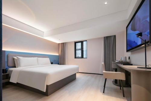 Imagen de la habitación del Hotel Atour Light Wuhan Jiangtan Jianghan Road Pedestrian Street. Foto 14