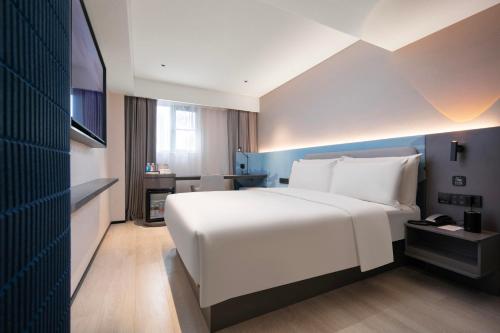Imagen de la habitación del Hotel Atour Light Wuhan Jiangtan Jianghan Road Pedestrian Street. Foto 16
