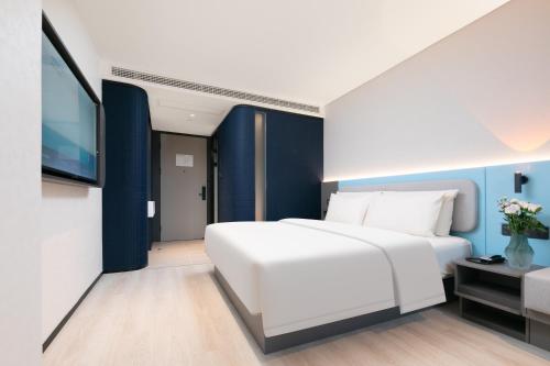 Imagen de la habitación del Hotel Atour Light Wuhan Wanxiang City Xinhua Road. Foto 10