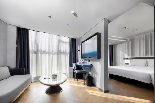 Imagen de la habitación del Hotel Atour Light Wuxi Nanchang Street Sanyang Plaza. Foto 6