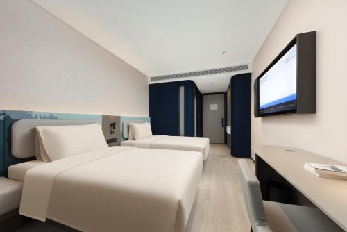 Imagen de la habitación del Hotel Atour Light Wuxi Taihu Lake Expo Center Financial Street. Foto 2