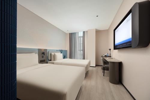 Imagen de la habitación del Hotel Atour Light Wuxi Taihu Lake Expo Center Financial Street. Foto 3