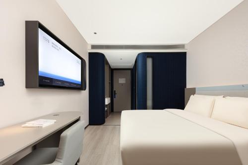 Imagen de la habitación del Hotel Atour Light Wuxi Taihu Lake Expo Center Financial Street. Foto 4