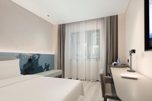 Imagen de la habitación del Hotel Atour Light Wuxi Taihu Lake Expo Center Financial Street. Foto 5