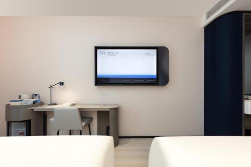 Imagen de la habitación del Hotel Atour Light Wuxi Taihu Lake Expo Center Financial Street. Foto 6