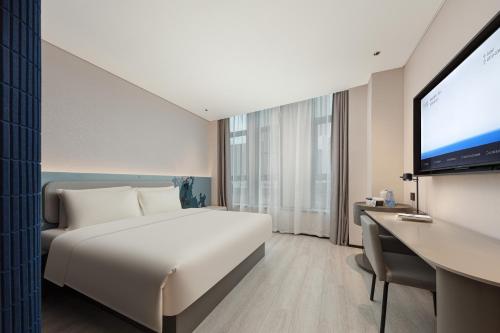 Imagen de la habitación del Hotel Atour Light Wuxi Taihu Lake Expo Center Financial Street. Foto 8