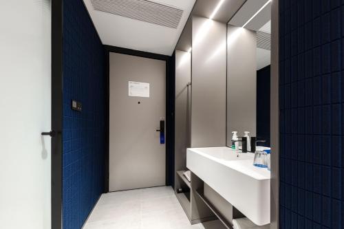 Imagen de la habitación del Hotel Atour Light Wuxi Taihu Lake Expo Center Financial Street. Foto 11