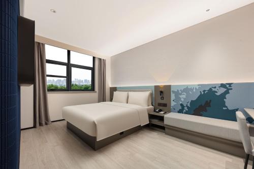Imagen de la habitación del Hotel Atour Light Wuxi Taihu Lake Expo Center Financial Street. Foto 12