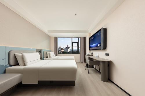 Imagen de la habitación del Hotel Atour Light Xishuangbanna Jinghong Gaozhuang. Foto 9