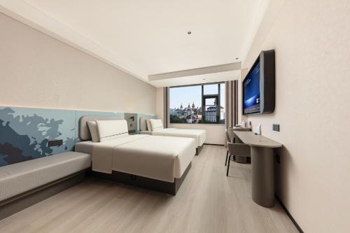 Imagen de la habitación del Hotel Atour Light Xishuangbanna Jinghong Gaozhuang. Foto 11
