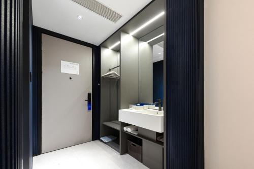 Imagen de la habitación del Hotel Atour Light Xishuangbanna Jinghong Gaozhuang. Foto 12