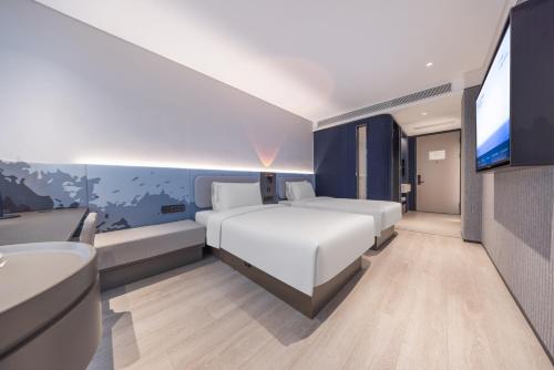 Imagen de la habitación del Hotel Atour Light Yangzhou Dongguan Street Ancient Canal Wharf. Foto 5