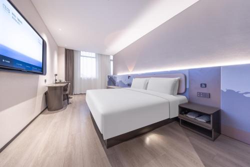 Imagen de la habitación del Hotel Atour Light Yangzhou Dongguan Street Ancient Canal Wharf. Foto 6