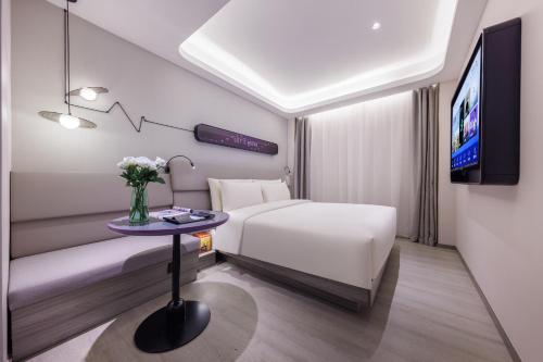 Imagen de la habitación del Hotel Atour Light Zhuguang Road Hongqiao National Exhibition and Convention Center. Foto 15