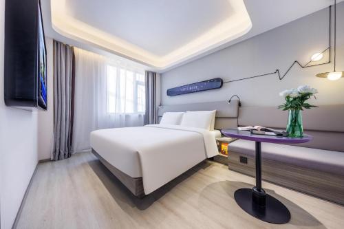 Imagen de la habitación del Hotel Atour Light Zhuguang Road Hongqiao National Exhibition and Convention Center. Foto 16