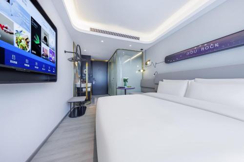 Imagen de la habitación del Hotel Atour Light Zhuguang Road Hongqiao National Exhibition and Convention Center. Foto 17