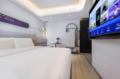 Imagen de la habitación del Hotel Atour Light Zhuguang Road Hongqiao National Exhibition and Convention Center. Foto 19