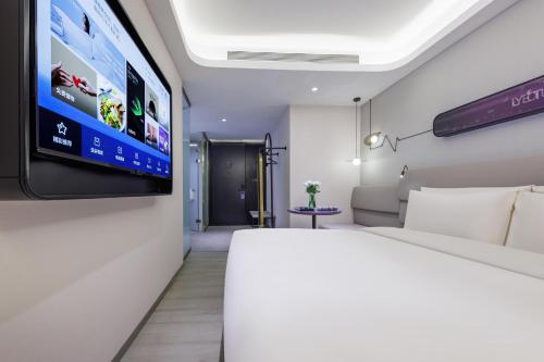 Imagen de la habitación del Hotel Atour Light Zhuguang Road Hongqiao National Exhibition and Convention Center. Foto 20
