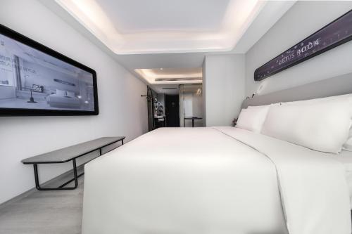 Imagen de la habitación del Hotel Atour Light Zhuhai Airport Aviation City Seaview. Foto 15