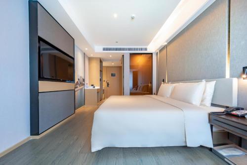 Imagen de la habitación del Hotel Atour Light Zhuhai Lovers Road Grand Theater. Foto 12