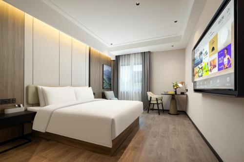 Imagen de la habitación del Hotel Atour Linqing City Center Liaocheng. Foto 11