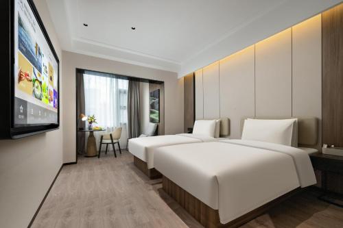 Imagen de la habitación del Hotel Atour Linqing City Center Liaocheng. Foto 12