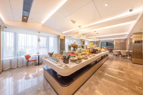 Imagen del bar/restaurante del Hotel Atour Linyi Beijing Road. Foto 10