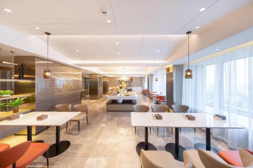 Imagen del bar/restaurante del Hotel Atour Linyi Beijing Road. Foto 11
