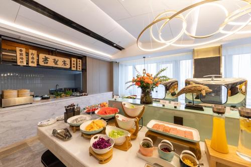 Imagen del bar/restaurante del Hotel Atour Linyi Beijing Road. Foto 12